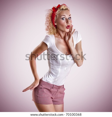 beautiful girl with pretty smile in pinup style on pink background