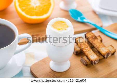 Breakfast with soft boiled eggs and toast soldiers
