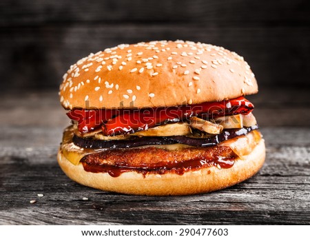Burger with chicken patty and vegetables