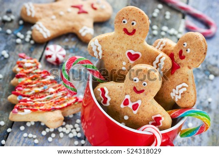 Christmas gingerbread cookies decorated colored icing for new year day, christmas party, winter holiday, sweet homemade gift for kids