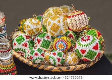 Traditional ethnic African handmade colorful bead toys balls. Christmas decorations. Unique craftsmanship. Local craft market in South Africa.