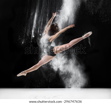 dance, ballet, beauty - ballerina dancing with flour, jump