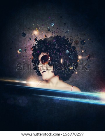 smiling woman with afro hair listen to music with headphones  over dark blue background