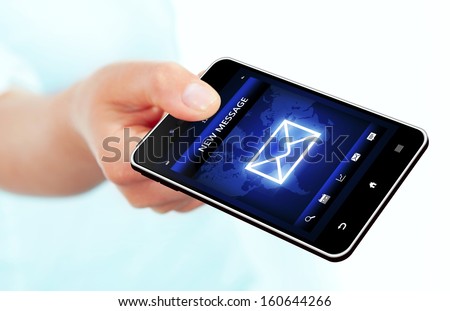 hand holding mobile phone with new message screen over white background