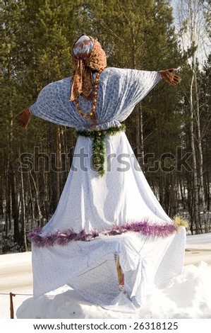 The dressed up snow figure in the form of dressed on snow whom of various clothes. It is a traditional Siberian ceremony of carrying out of winter