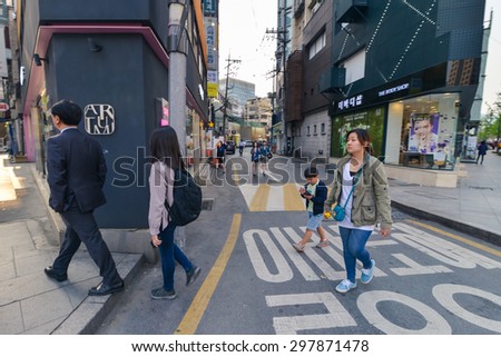 SEOUL, SOUTH KOREA - CIRCA APRIL 2014: People walk in the Seoul downtown circa 2014.
