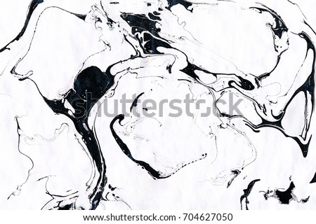Black and white marble background. Ink marble texture. Abstract painting. Beautiful abstract backdrop.