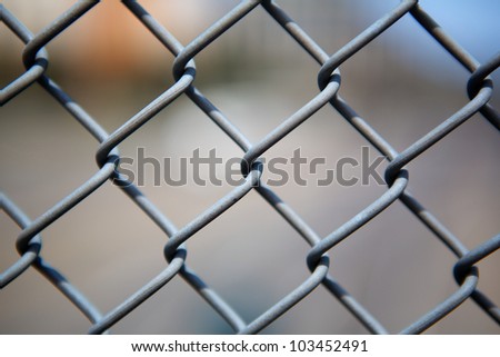 Narrow Dept of Field close up image of chain link fence