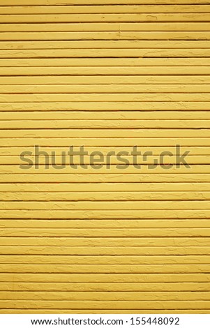 Weather Yellow wood wall vertical composition with horizontal planks