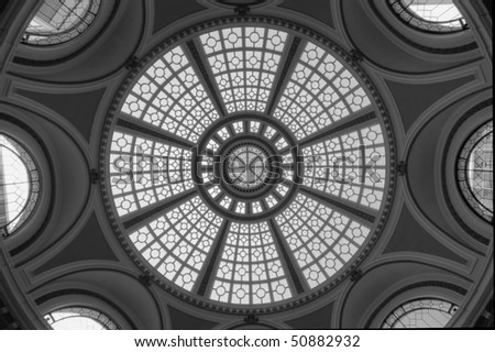 Black and white image of a windowed domed ceiling