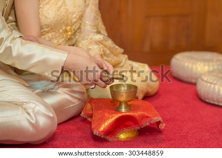 Holy water in thai ceremony. Wedding thai style