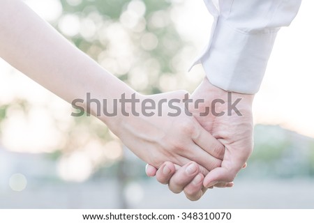 hands holding together for cheerful healing love