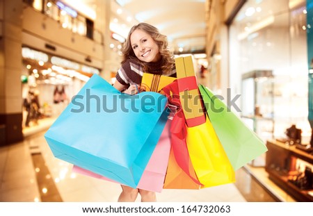 happy smiling Santa woman shopping, background digitally added, work path