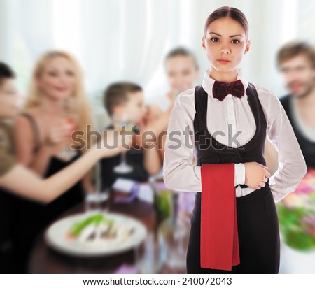 Waitress with a red cloth and tie in restaurant. Isolated with work path.