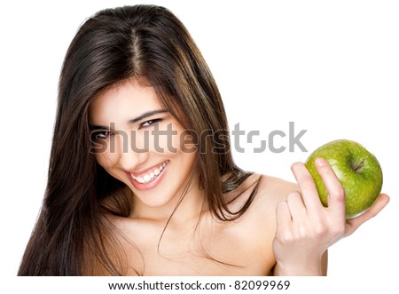 topless young female smiling at camera holding granny smith apple in
