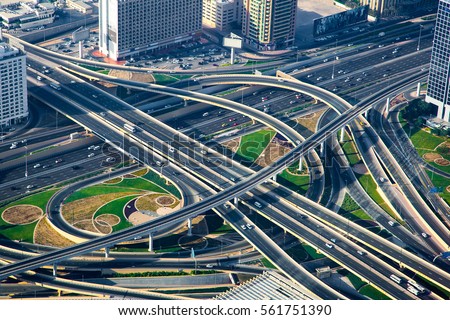 Amazing view of the junction roads from above. Traffic on the highway. Background wallpaper photo.