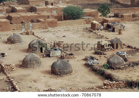 Traditional straw huts and mud houses in Hombori in Mali