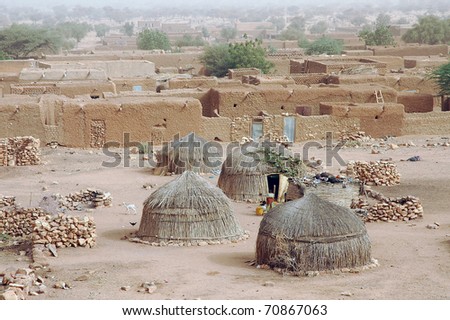 Close up of traditional straw huts and buildings in Hombori in Mali