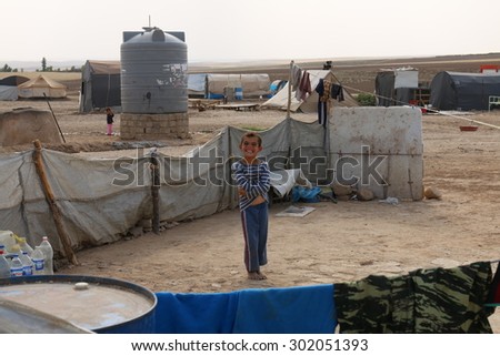 KHANKE REFUGEE CAMP, DOHUK, KURDISTAN, IRAQ - 2015 JULY 30 - Unidentified refugee in Khanke (khanke) camp near Dohuk in Northern Iraq