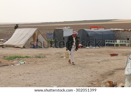 KHANKE REFUGEE CAMP, DOHUK, KURDISTAN, IRAQ - 2015 JULY 30 - Unidentified refugee in Khanke (khanke) camp near Dohuk in Northern Iraq