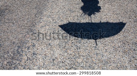 umbrella shadow on street vintage and hipster
