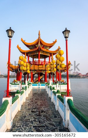 Temple in the middle of the lake, messages on the lanterns along the path translates to wishing good health, luck and prosperity.
