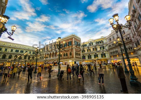 MACAU, CHINA - MAR 2016 - The interior facade of the Grand Canal Shoppes located inside the Venetian Hotel and Casino taken on 13 March 2016. There are gondolas ferrying people around the canal.