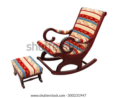 Rocking chair and a foot stool upholstered with native ornament cloth. Isolated on white background.