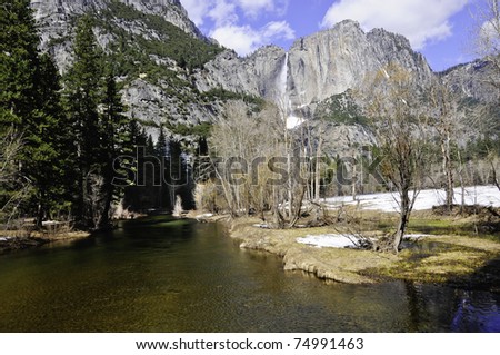 Merced river in Yosemite National Park and a water fall in the back ground