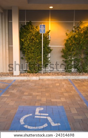 Parking spot for disabled person in the evening, California, USA.
