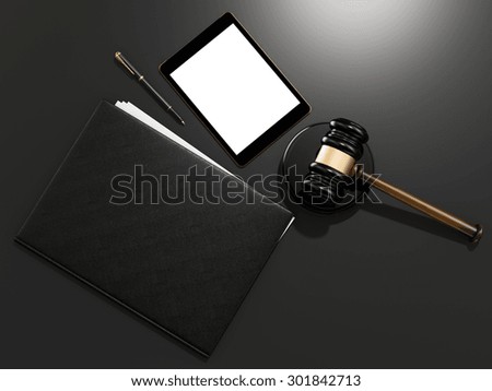 Wooden judges gavel and  tablet computer on black table  high resolution