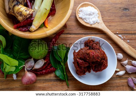 recipe book with fresh herbs south asia and spices on wooden background, thai food.