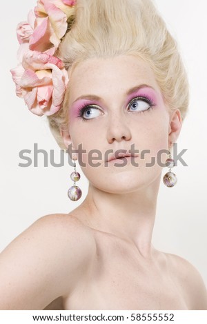 stock photo : Portrait of beautiful young woman with stylish make-up and medieval hairstyle