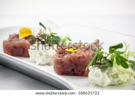 Tuna tartare with white asparagus mousse,sweet pea puree