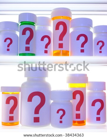 Close crop of medicine cabinet shelves filled with pill bottles, each labeled with a red question mark.  Bottles and shelves are  lit with cooler blue light and are strongly backlit with white light.