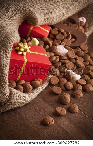 \'De zak van Sinterklaas\' (St. Nicholas\' bag) filled with \'pepernoten\', a letter of chocolate and sweets. All part of the traditional Dutch holiday \'Sinterklaas\'.