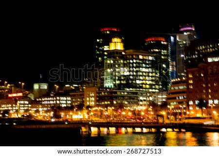 Night view of the San Francisco waterfront skyline with intentional motion blur. Abstract