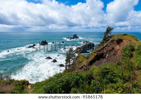 Dramatic seascape, cliffs and billowing clouds on the beautiful Oregon coast