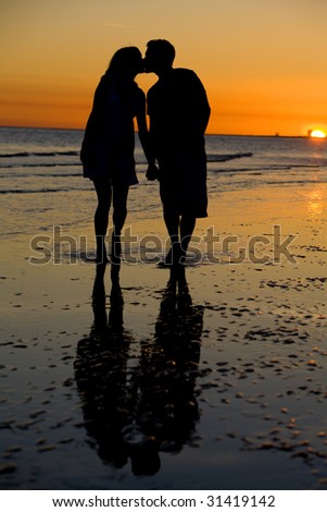 couple kissing sunset. stock photo : A Couple Kissing