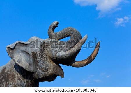 Fake elephant head in blue sky
