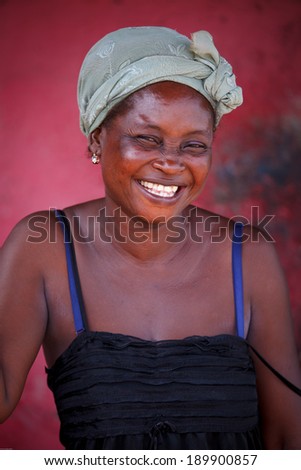 ACCRA, GHANA - MARCH 18: Unidentified African woman  pose with smiling face on March 18, 2014 in Accra, Ghana. Ghana is one of the most popular  tourists destination in Africa.
