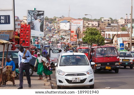 ACCRA, GHANA - MARCH 18: Traffic on road in Accra, capital city of Ghana on March 18, 2014 in Accra, Ghana. Ghana is one of the most popular tourists destination in Africa.