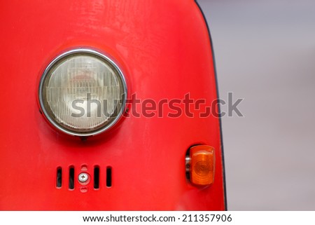 Vintage style motorcycle light with red body