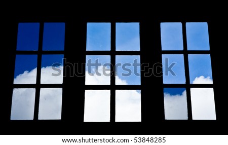 Blue sky view look from dirty glass window
