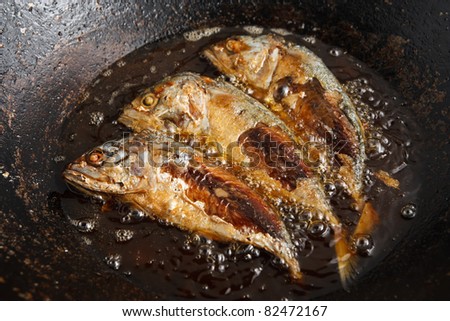 Fish frying in hot oil