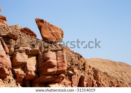 Picturesque unstable red rock in Negev desert, Israel