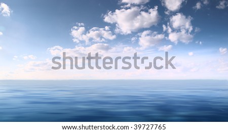 Seascape: quiet sea and bright sky with clouds
