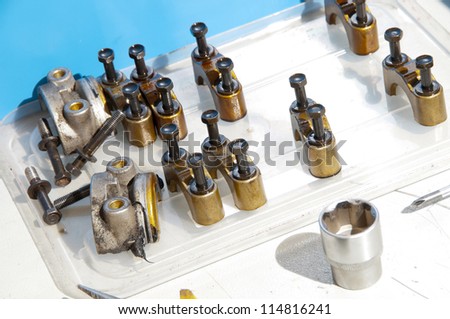 Connecting rods bottom heads on a workshop table