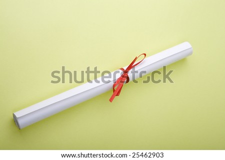 Isolated Paper Scroll with red ribbon