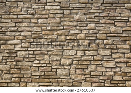 stock-photo-unshaped-stone-wall-pattern-wall-made-of-rocks-27610537.jpg